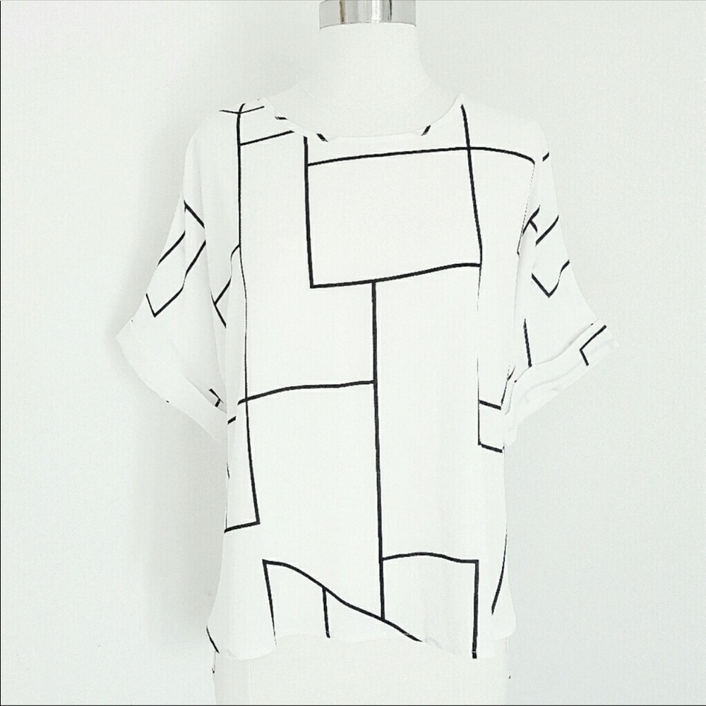 Abstract black and white blouse with tails